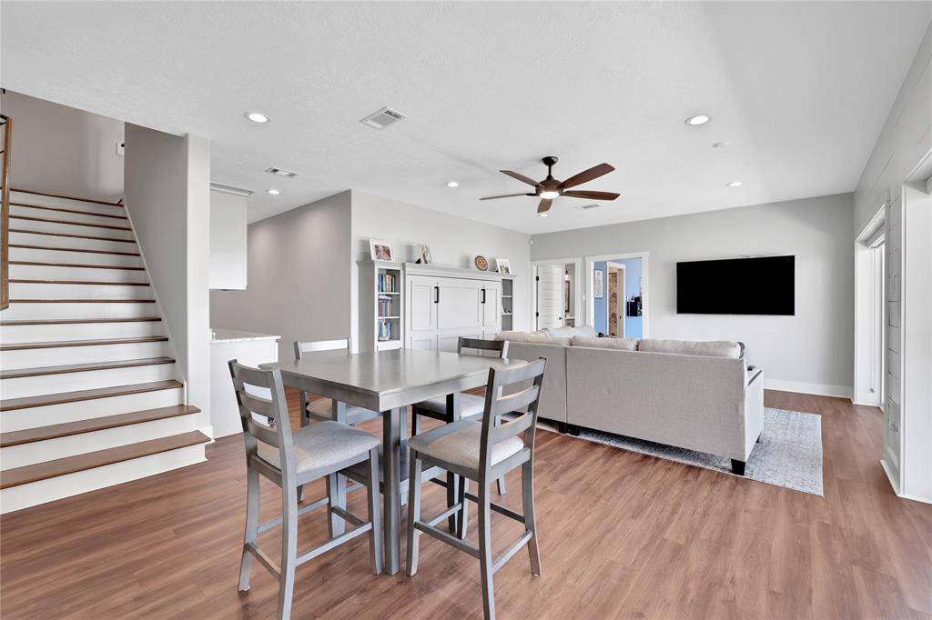 Downstairs leads to an additional living area with kitchenette and lake views