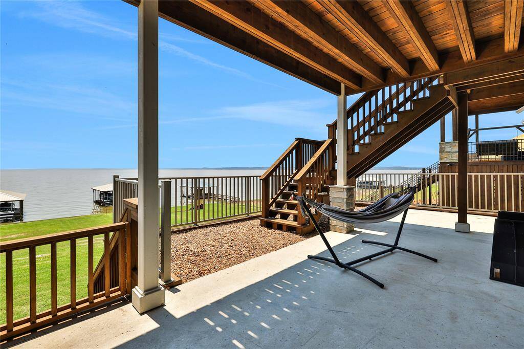 From the lower living area you flow out to a covered patio