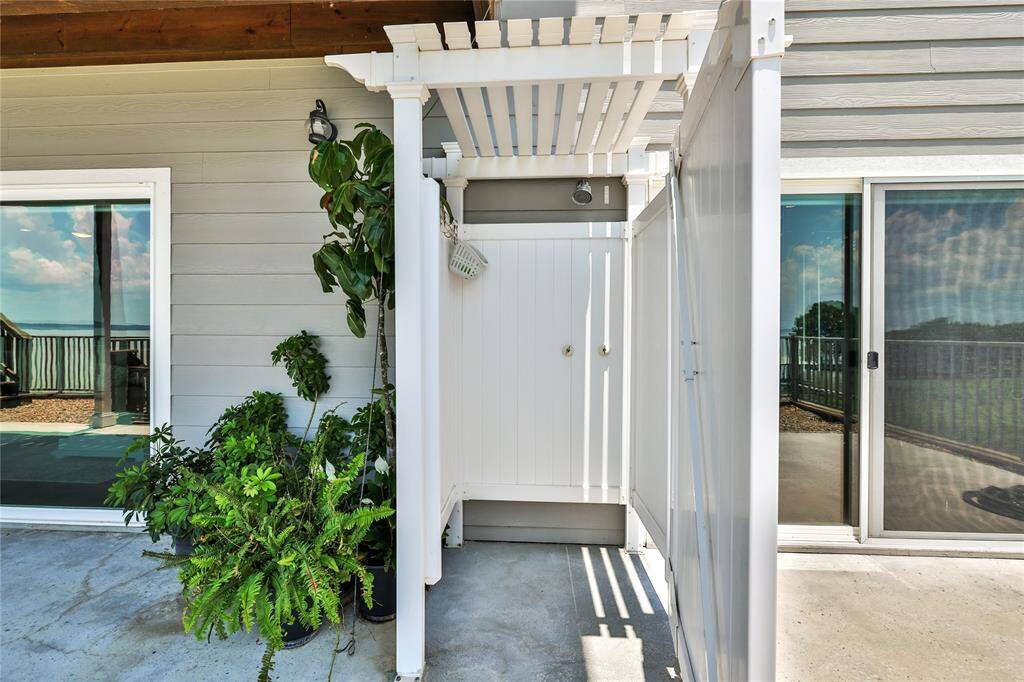 The outdoor shower is perfect for after a workout, gardening or a day on the lake!