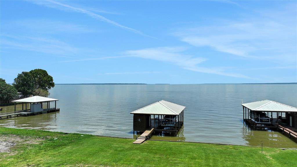 This great boat house features a spacious storage room, custom fish cleaning station, lights and WiFi capability