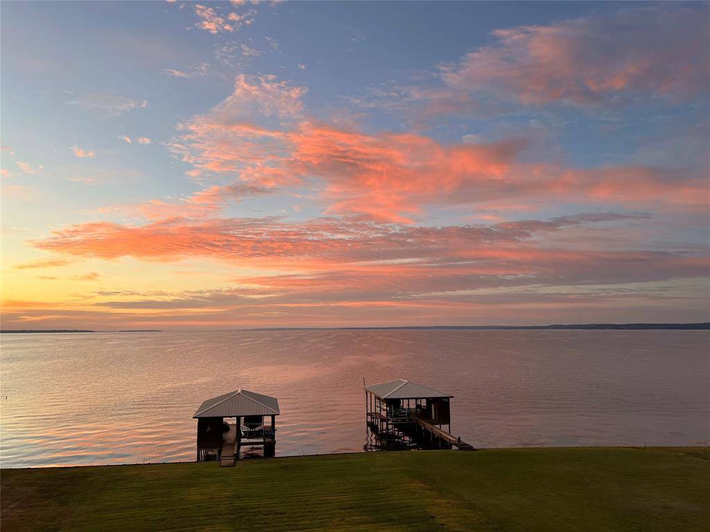 Imagine yourself here, unwinding as the sun paints the sky over Lake Livingston!