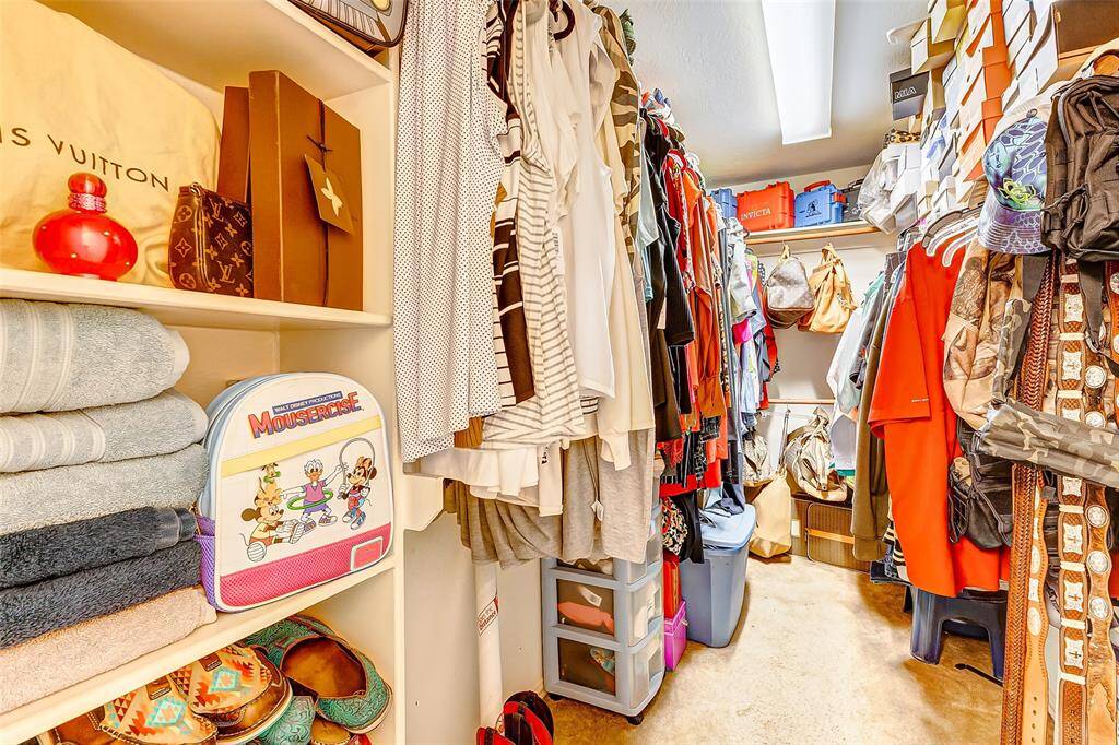 PRIMARY BEDROOM-WALK IN CLOSET