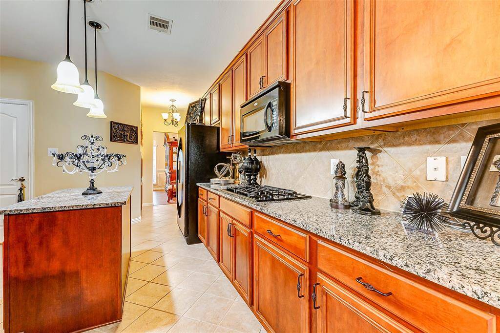 PLENTY OF CABINET SPACE IN KITCHEN