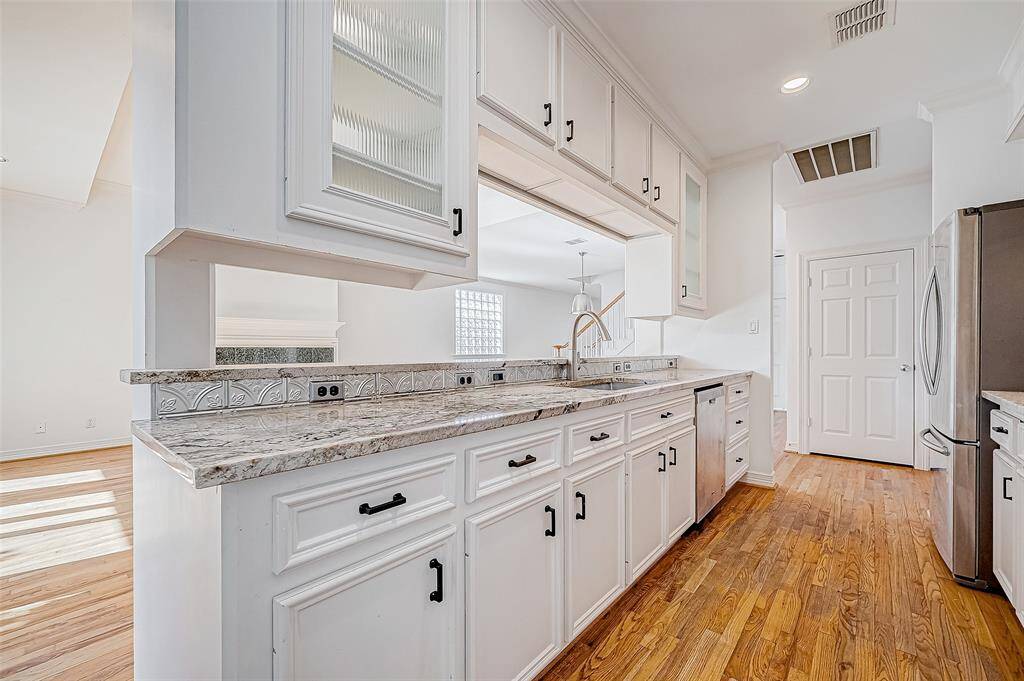 A chef's haven with updated finishes and  ample workspace