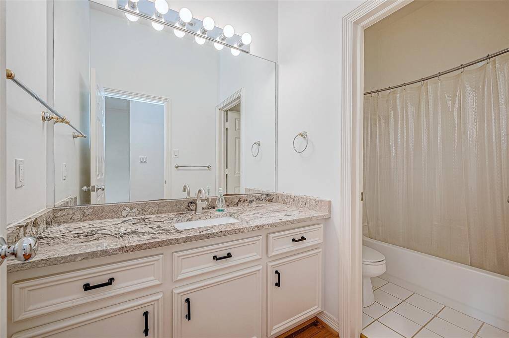 Secondary bedrooms share this bathroom.
