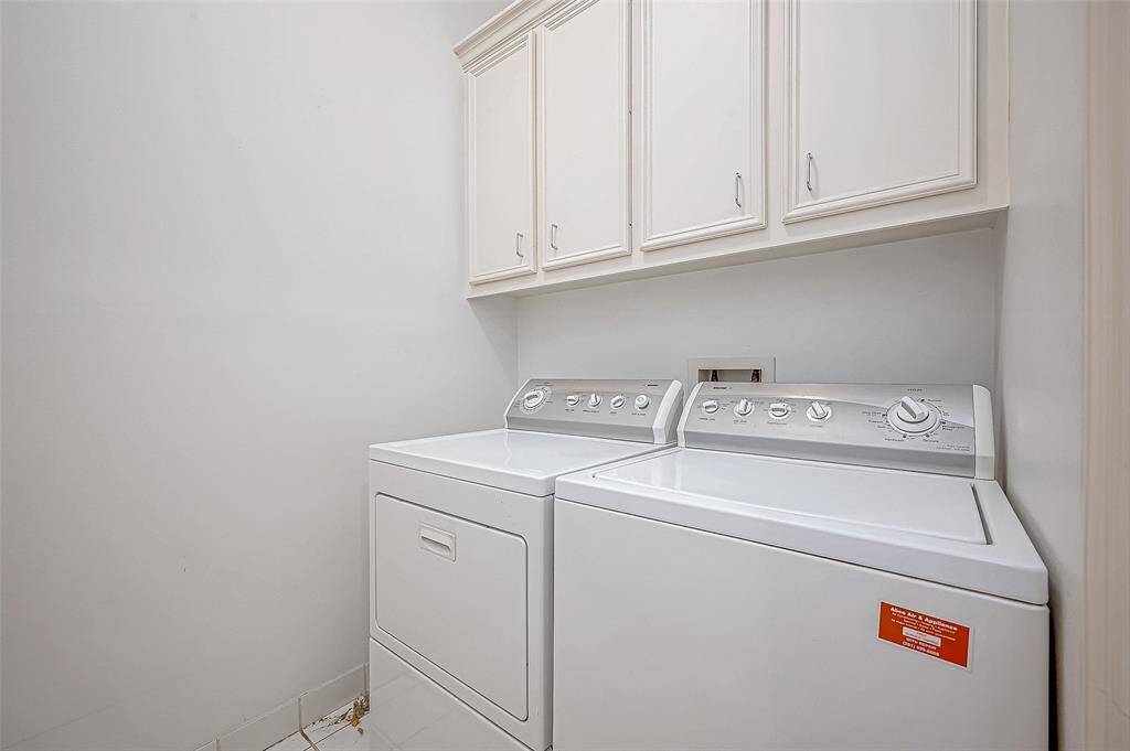 Laundry room located upstairs for extra convenience.