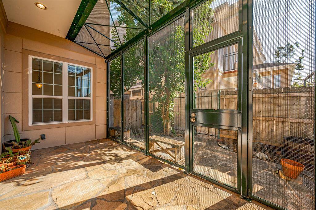 Flagstone patio flooring, covered from the rain, screened from the bugs!!  If you have pets, they will also love coming out to soak up the sun.