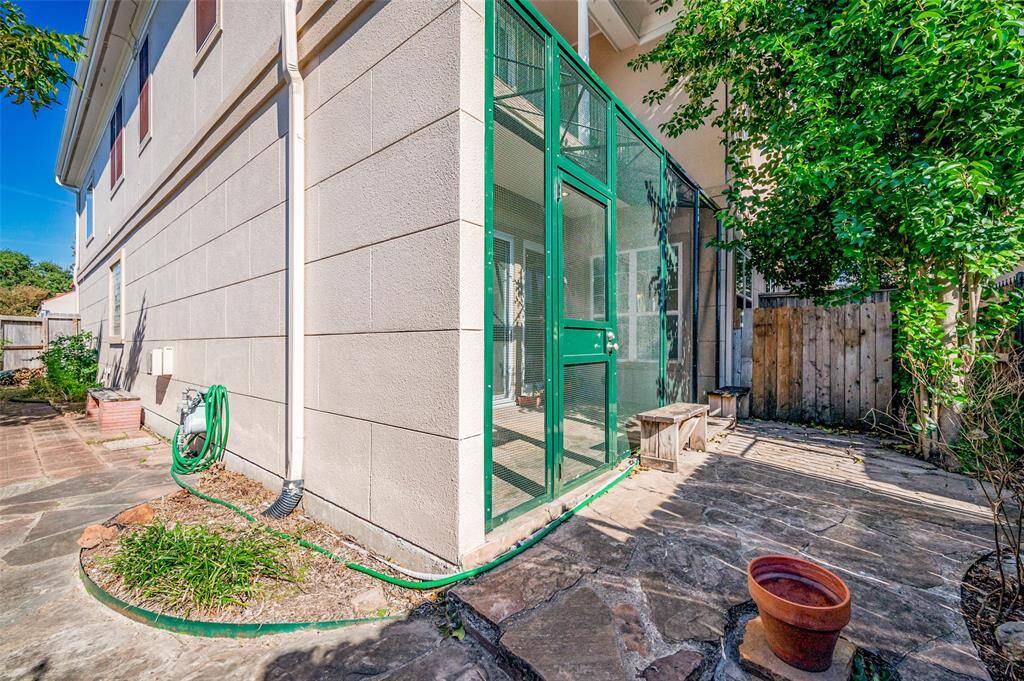 Exterior of the home - extended flagstone patio area at back and side yards.