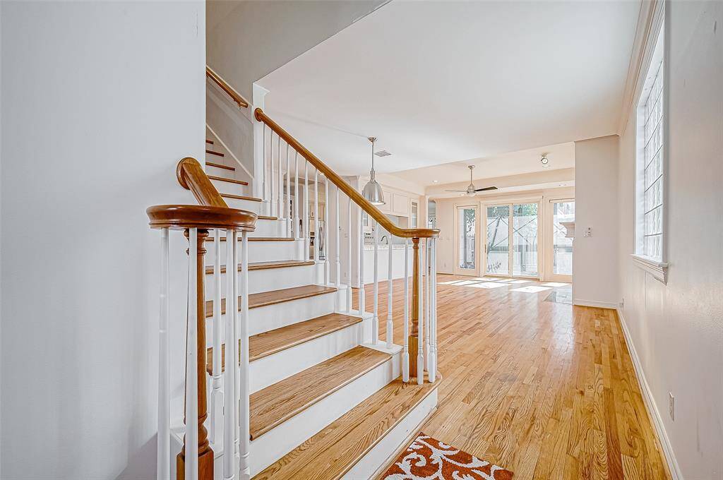 As you come thru the front door, you'll enter the grand family room - its open style lends itself to multiple furniture layout and ease of entertaiinment.
