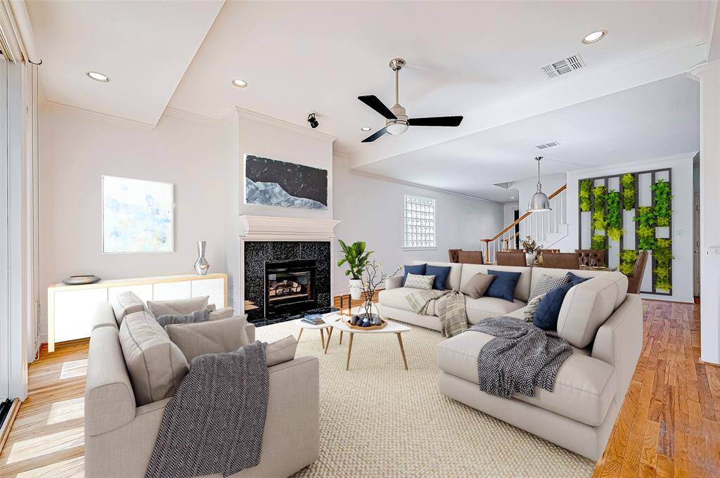 Gas-log fireplace is the focal point of this room.  This virtual furniture layout shows combo living/dining area and buffet table for easy entertaining.