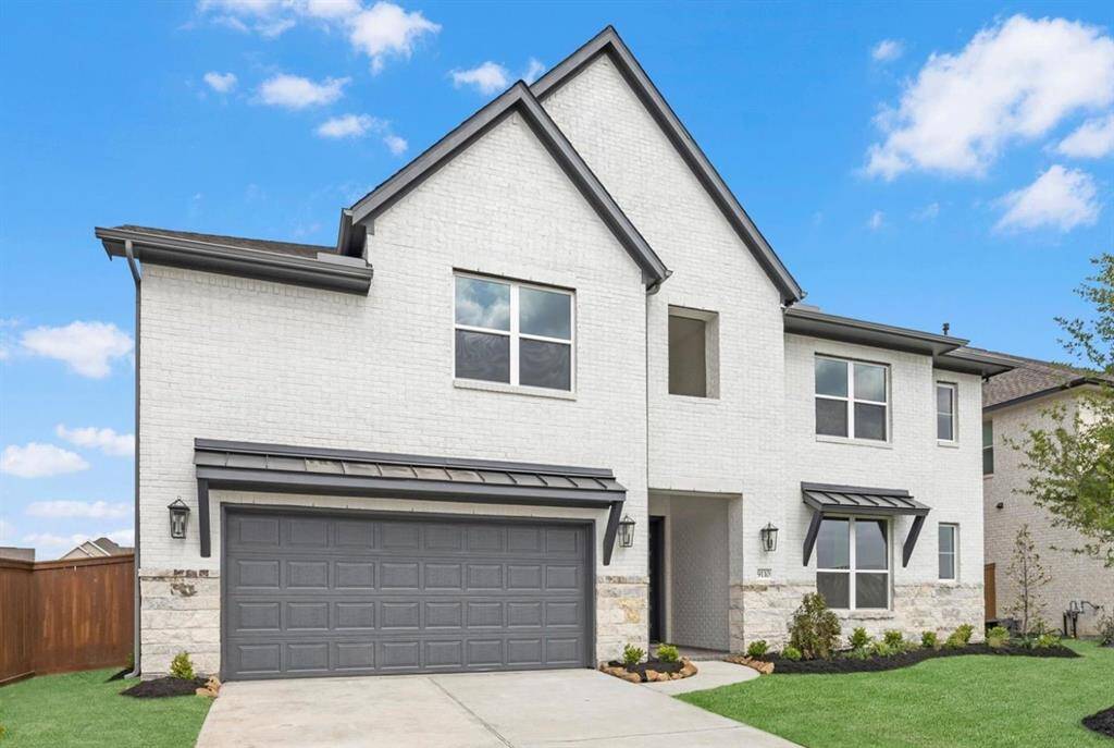 MOVE IN READY!! Westin Homes NEW Construction (Naples II, Elevation A) Two story. 4 bedrooms, 3.5 baths. Green grass added to enhance photo.