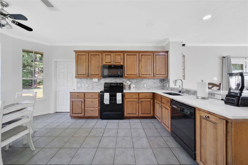 Cabinet space galore with quartz countertops!
