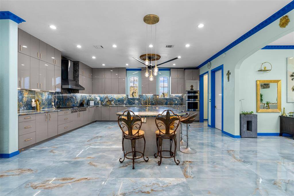 Large multi shelf walk in pantry located to the side