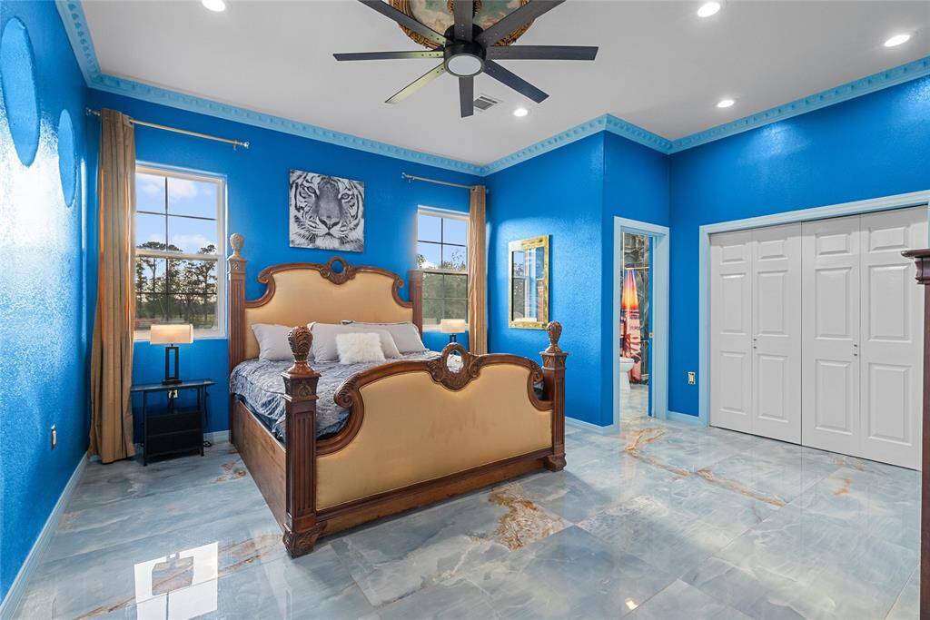 Large bedrooms on 2nd floor, porcelain floors, lots of natural light, ceiling fans, and private full bath, all trimmed with crown molding