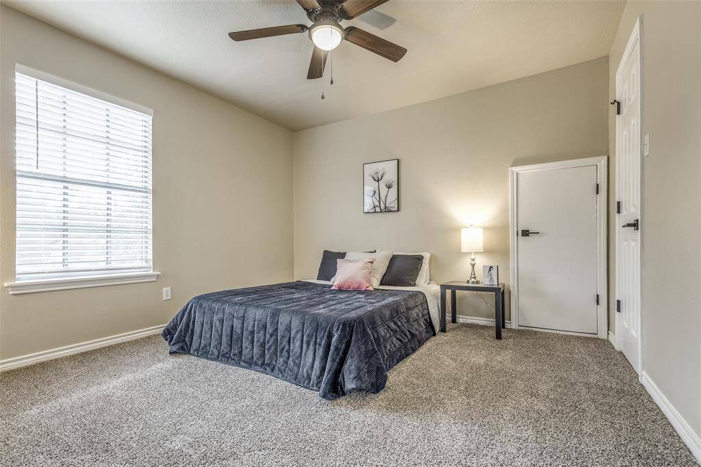 Bedroom # 4 offers a spacious walk-in closet and access to the walk-in attic.