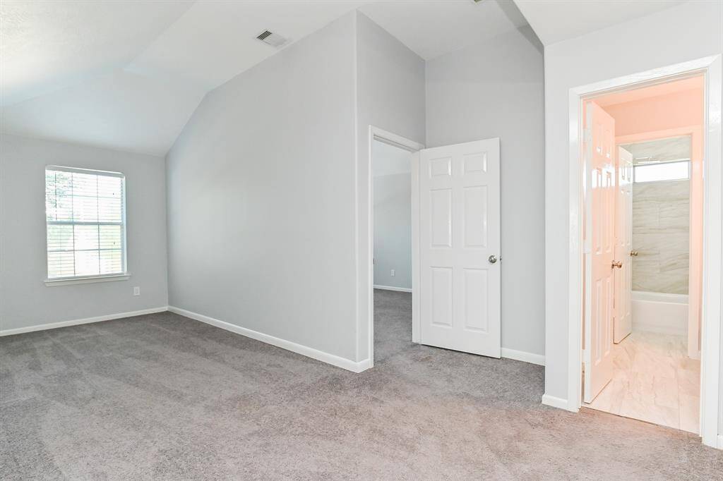 The ensuite bath in this bedroom makes it perfect for visiting guests!