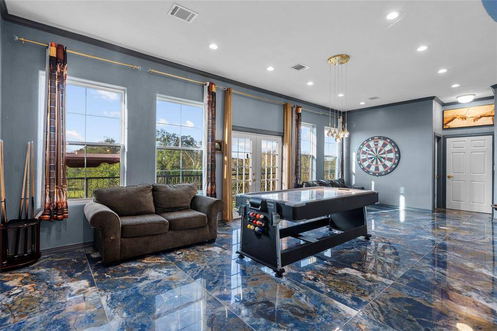 2nd floor recreation area outdoor balcony, wet bar , porcelain floors, open concept
