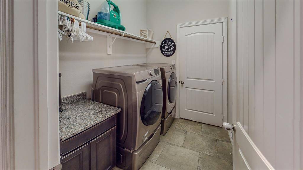 Laundry with shelving and folding station