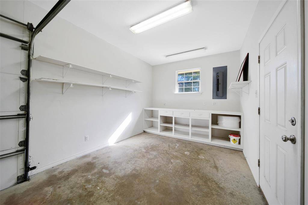 Additional Space in the garage that leads to the screened in patio!