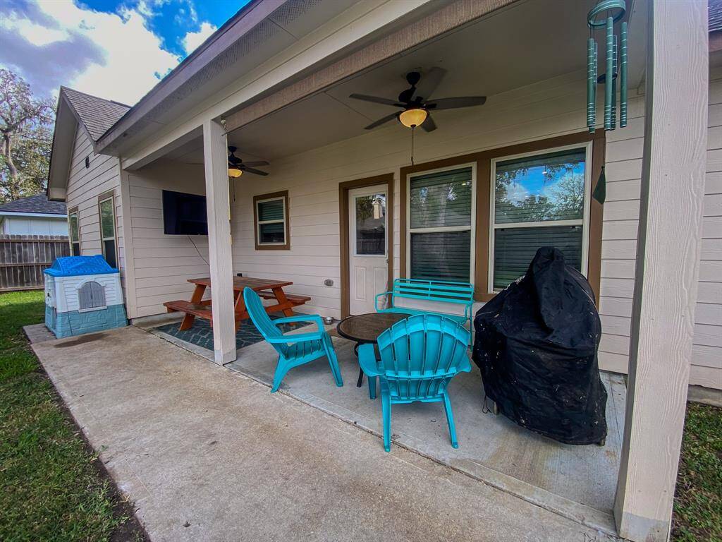 Back patio, covered and fans for comfort