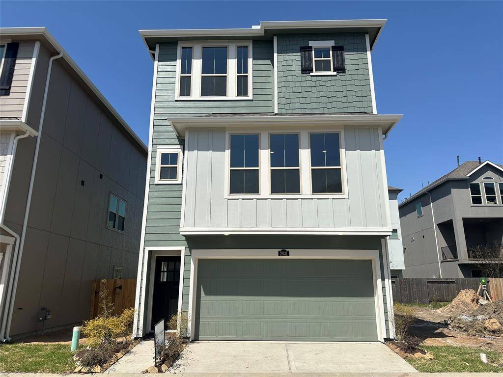 Three-story home with 4 bedrooms, 3.5 baths and 2 car garage