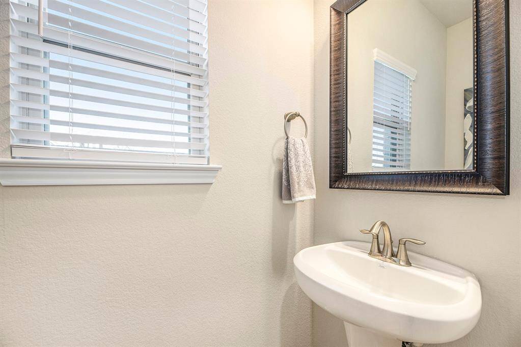 There is a half bath downstairs for the guests