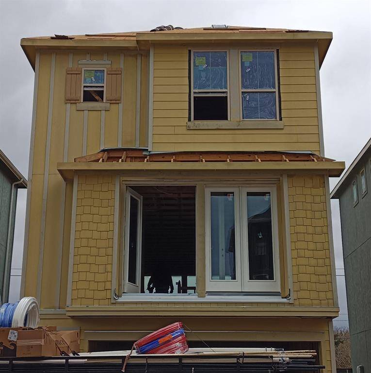 Three-story home with 3 bedrooms, 3.5 baths and 2 car garage