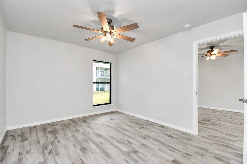 View of the main bedroom standing by the bathroom door