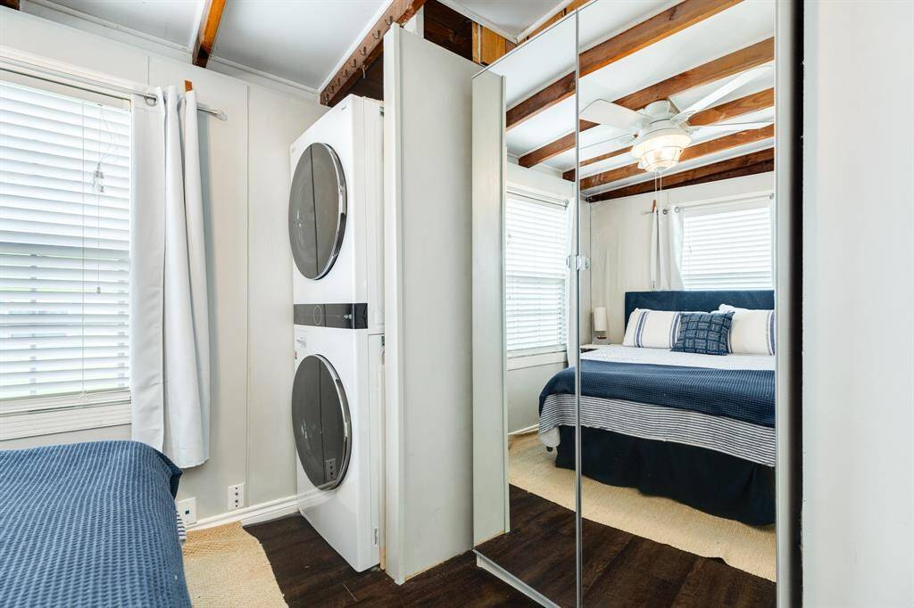 Conveniently located in the master bedroom is a full size stacked washer and dryer.