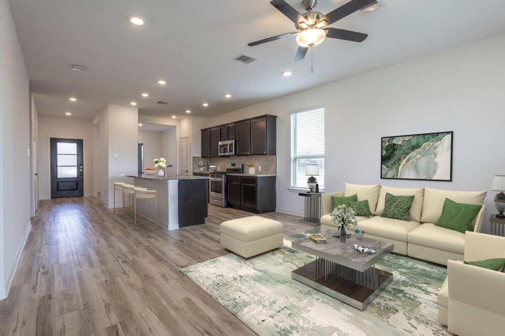 STAGED: Open floorplan with beautiful, resilient flooring.
