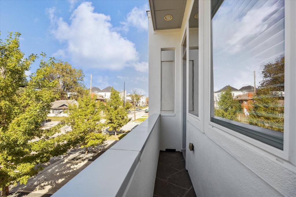 Juliet balcony that overlooks the front of the home.