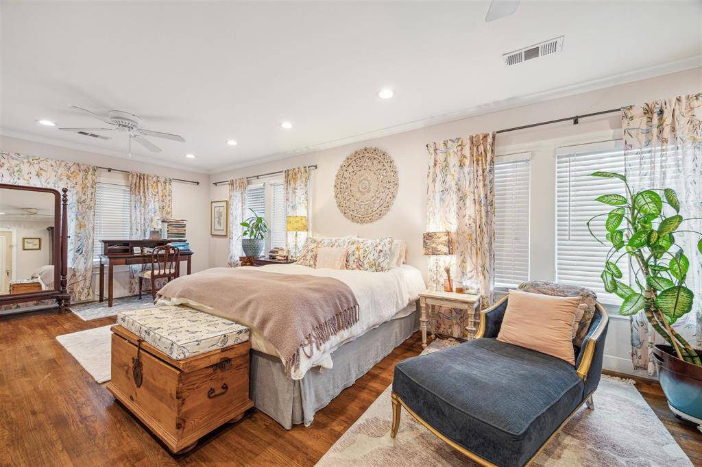 Large single bedroom transformed from 2 smaller bedrooms includes 2 walk-in closets.