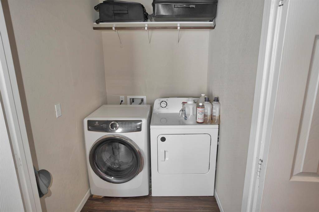 Utility room inside the home gives easy access for a load of laundry.