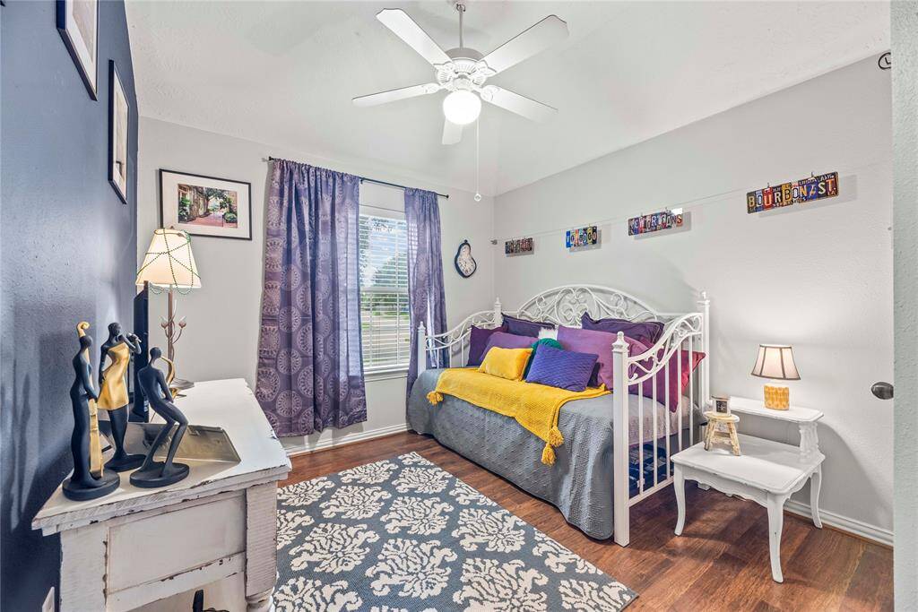 In addition to the study and primary suite, you'll also find two very spacious guest rooms. Each bedroom offers durable and beautiful laminate flooring, a lit fan, large closet and easy access to a full bathroom.