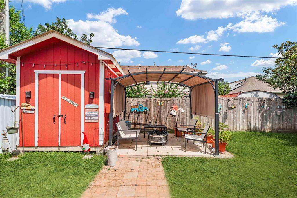 This handy garden shed and extended patio are a great start to what will be your backyard oasis.
