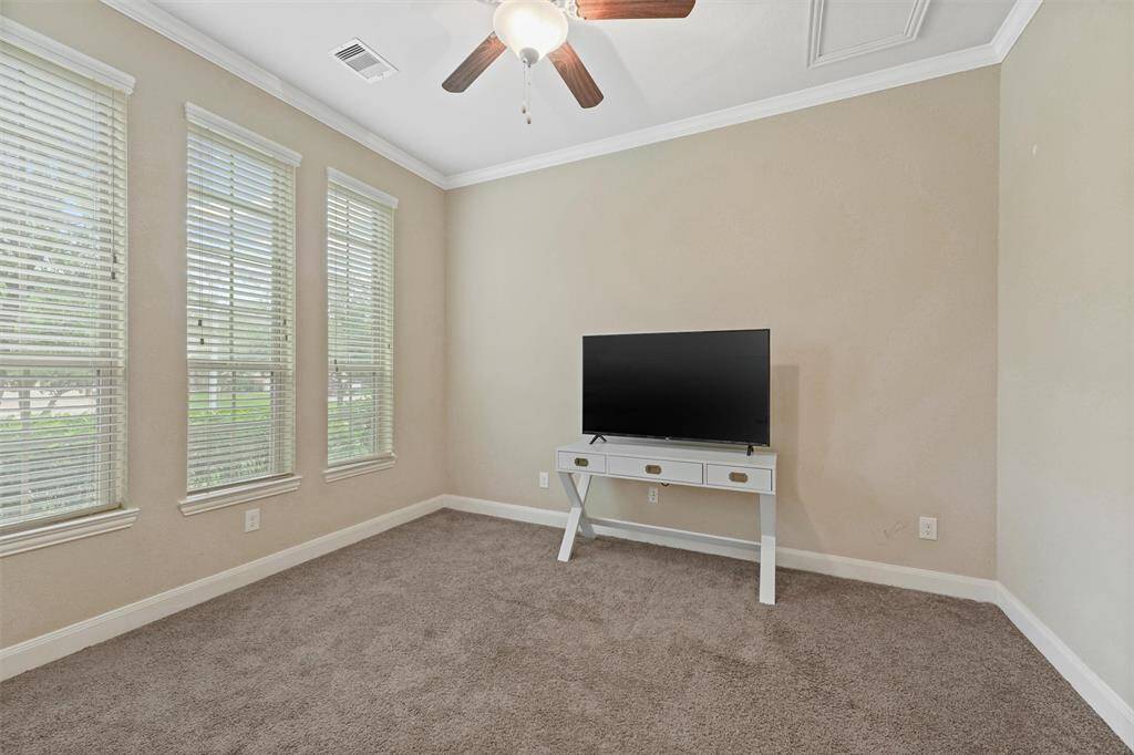 Carpeted flooring provides comfort and warmth. Perfect for relaxing or working from home.