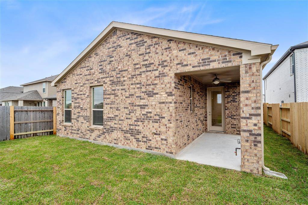 Come and see this spacious backyard with its covered patio! There is plenty of room for the kids to play and adults to relax! Perfect for your outdoor living space, patio furniture, bbq pit, and so much more. The possibilities are endless!
