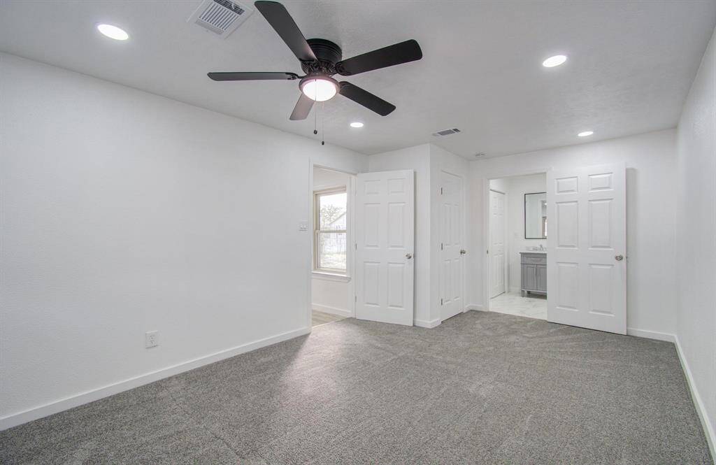 Cozy first bedroom with plenty of natural light and a spacious closet