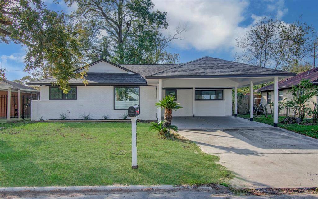Inviting front view with a modern facade, landscaped yard, and excellent curb appeal