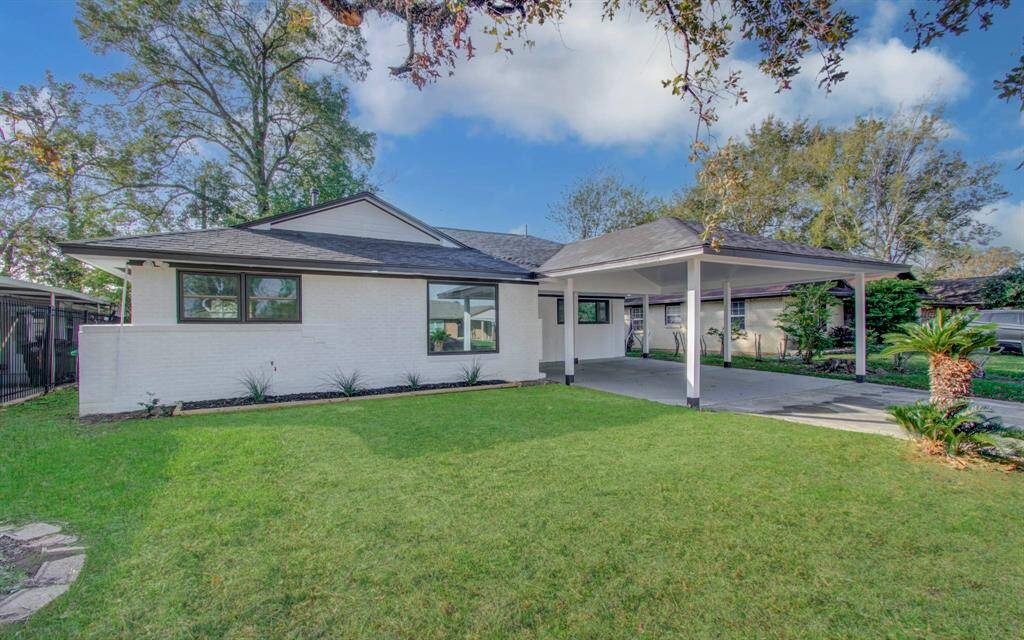 Inviting front view with a modern facade, landscaped yard, and excellent curb appeal