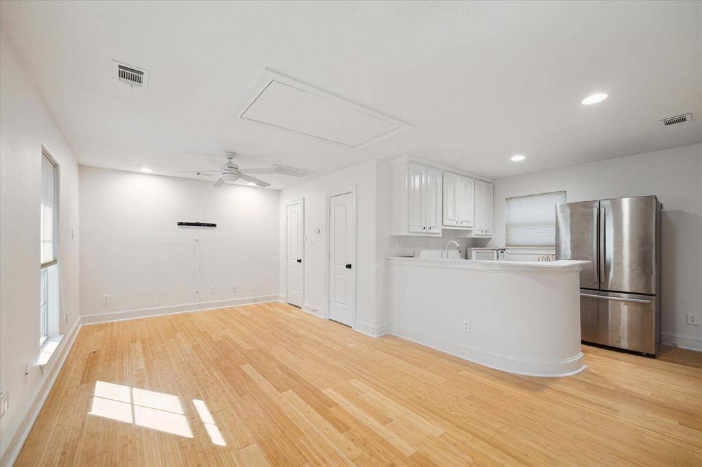 A separate, full apartment, located over the detached garage, with its own entrance.  Perfect for long term guests, or rented out.