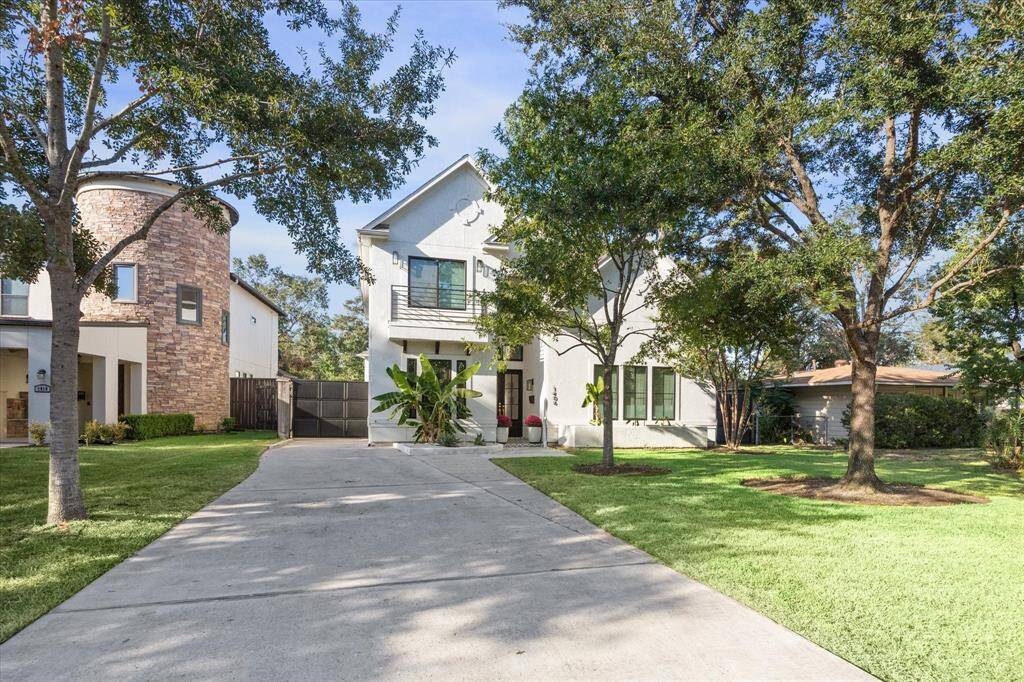 Modern sophistication meets comfort inside the stately white stucco with beautifully renovated, modern transitional interior.  Whole house generator installed for comfort and peace of mind.