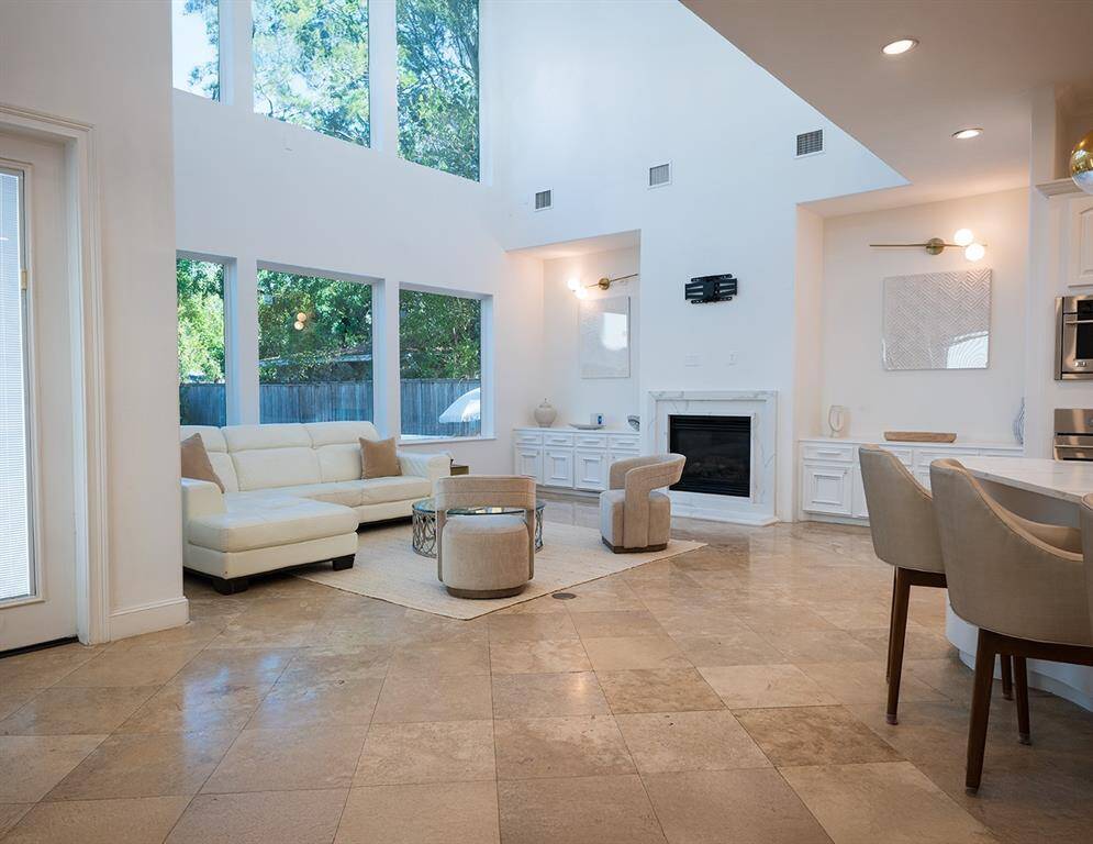 Cozy up to the indoor fireplace - or enjoy the outdoor firepit. Expansive views bring the outdoor in.