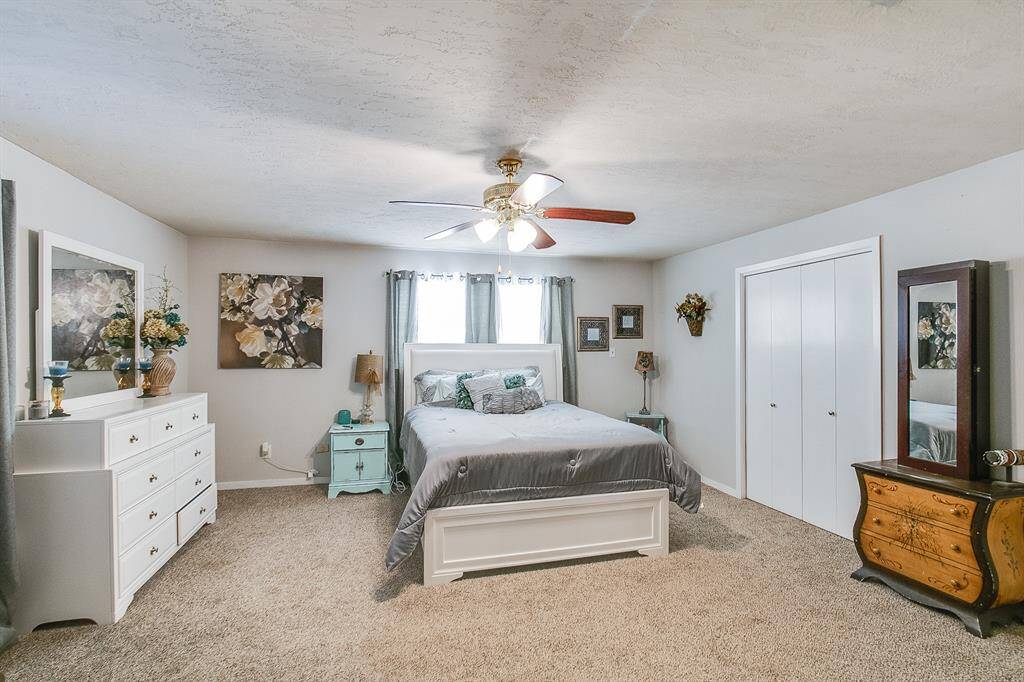 This is a previous photo of when home was occupied. Staged, flooring has been changed.