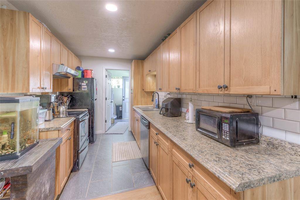 Kitchen with granite countertops