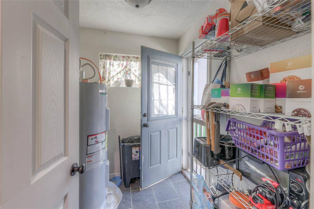 End of the kitchen going out to the backdoor