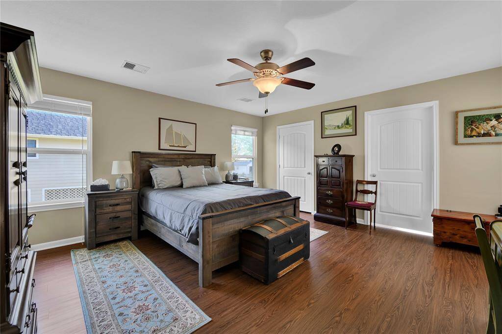 Spacious primary bedroom is separate from the other bedrooms and boasts a large walk in closet.
