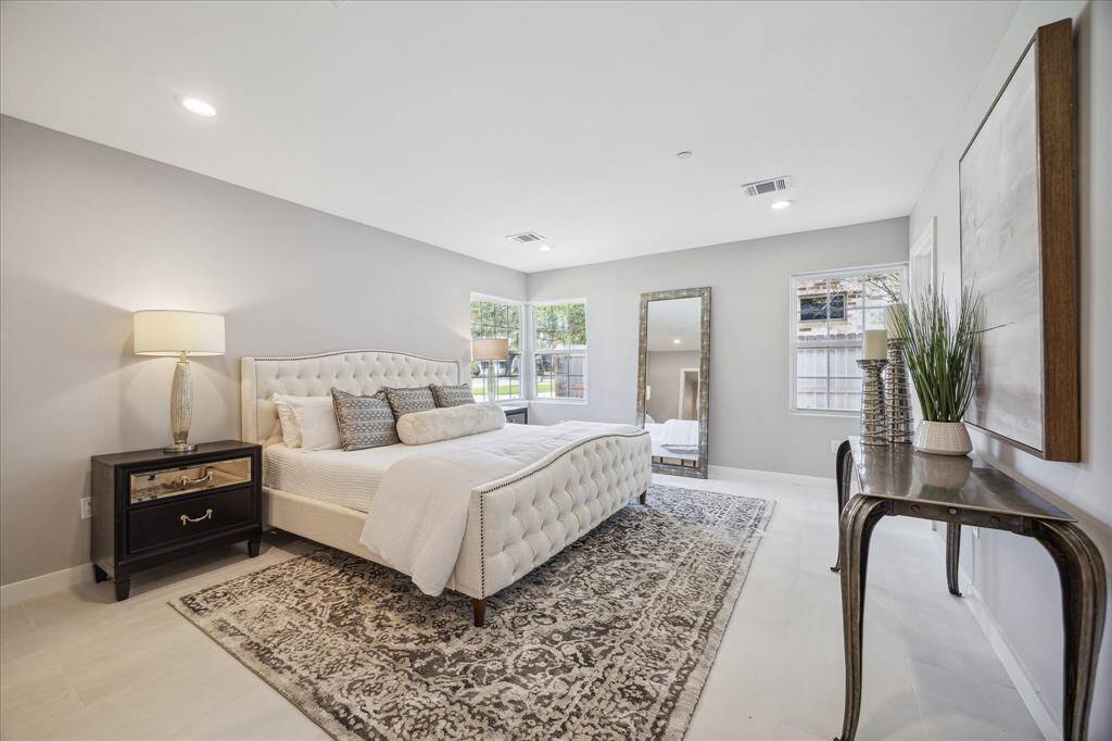 Primary suite discreetly tucked away from the main areas for privacy.