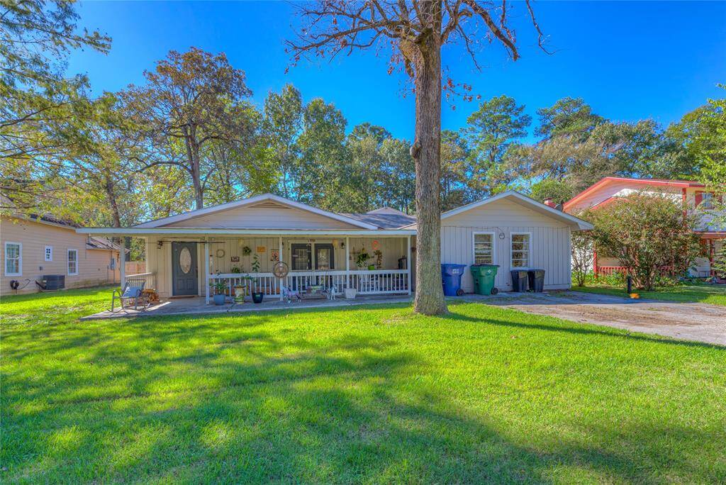 The front of the house with a 2 car wide driveway
