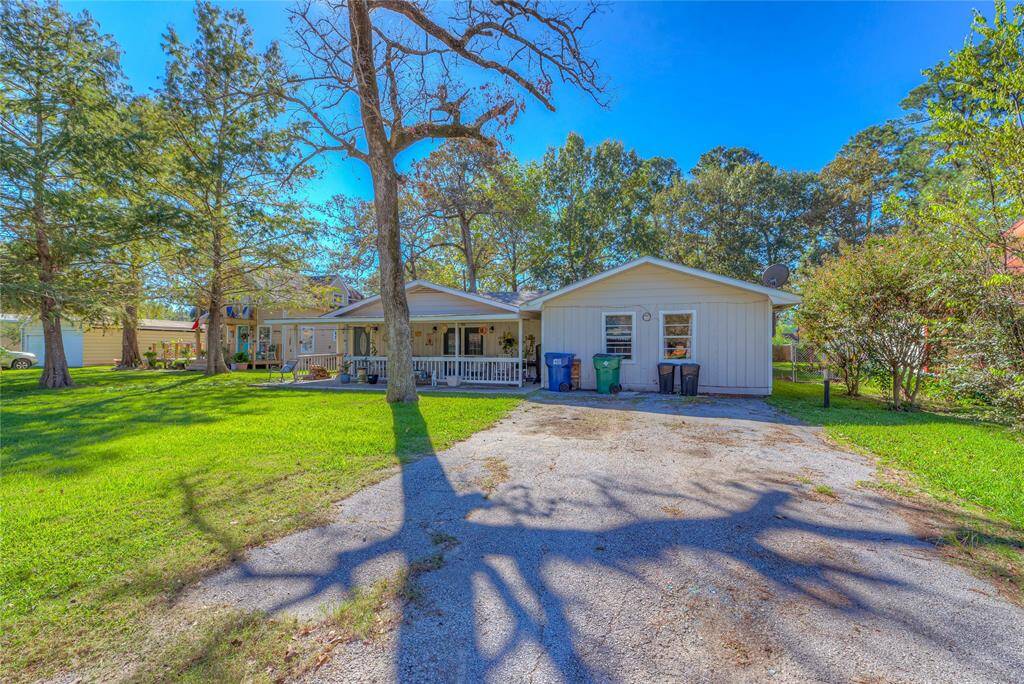 The front of the house with a 2 car wide driveway